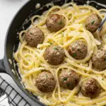 Garlic Butter Meatballs over Creamy Parmesan Linguine