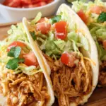 Slow Cooker Queso Chicken Tacos